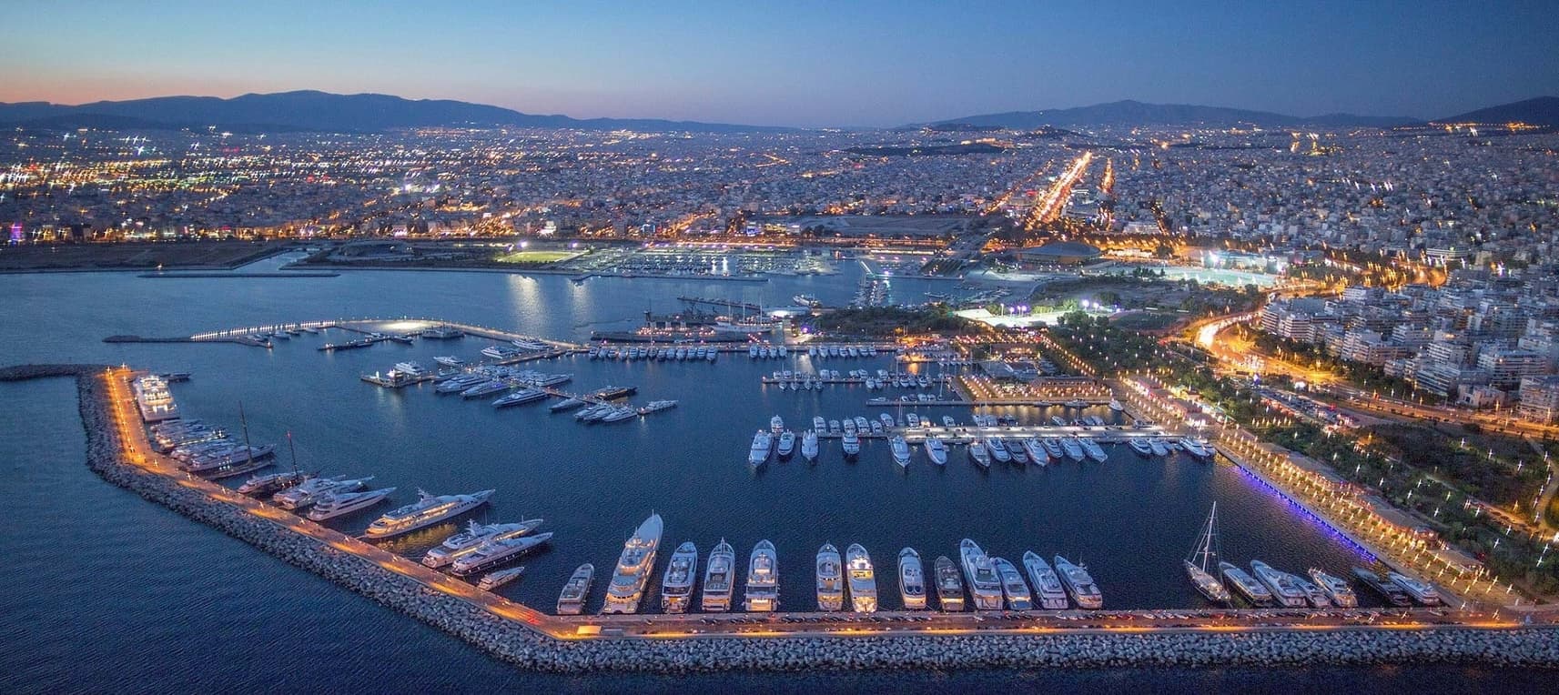 Aerial photgraph of Flisvos Marina with Athens city in background