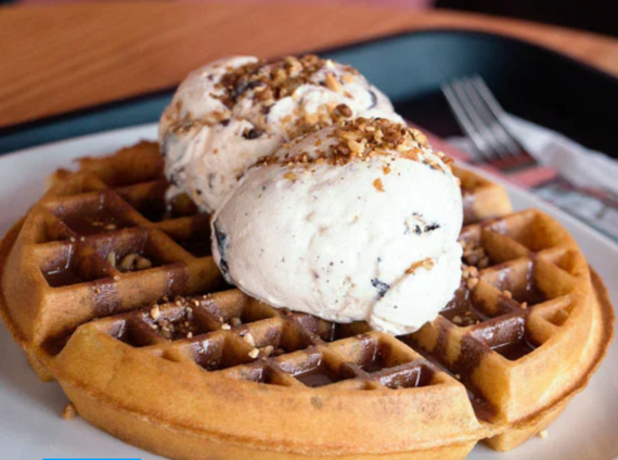 Waffle with two scoops of ice cream on top