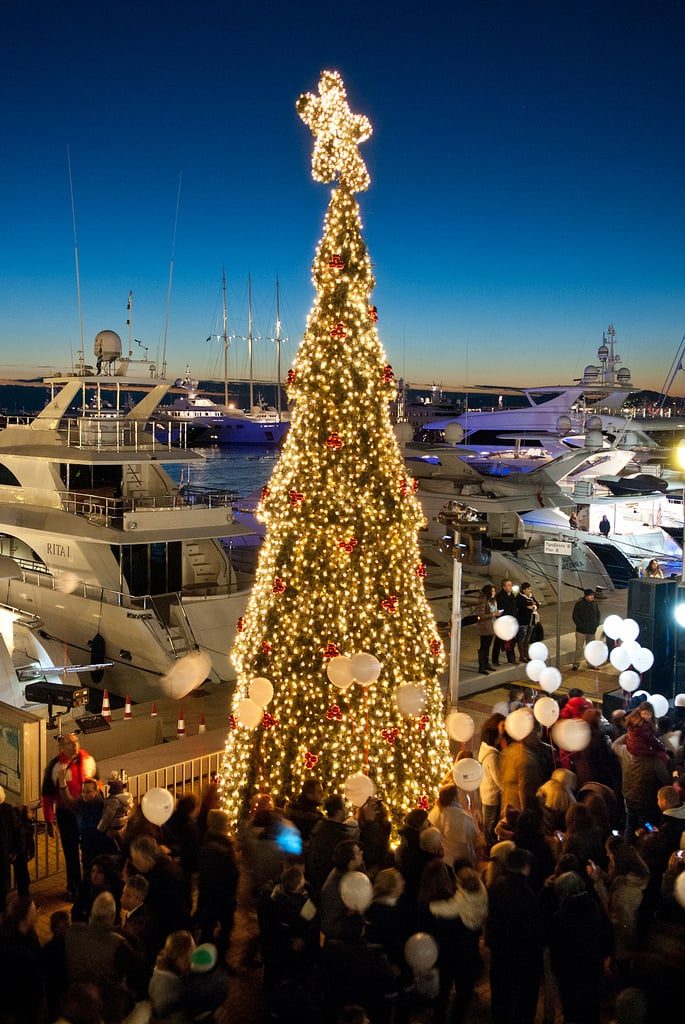 Christmas celebrations with lit pine tree on Flisvos Marina , Athens dock