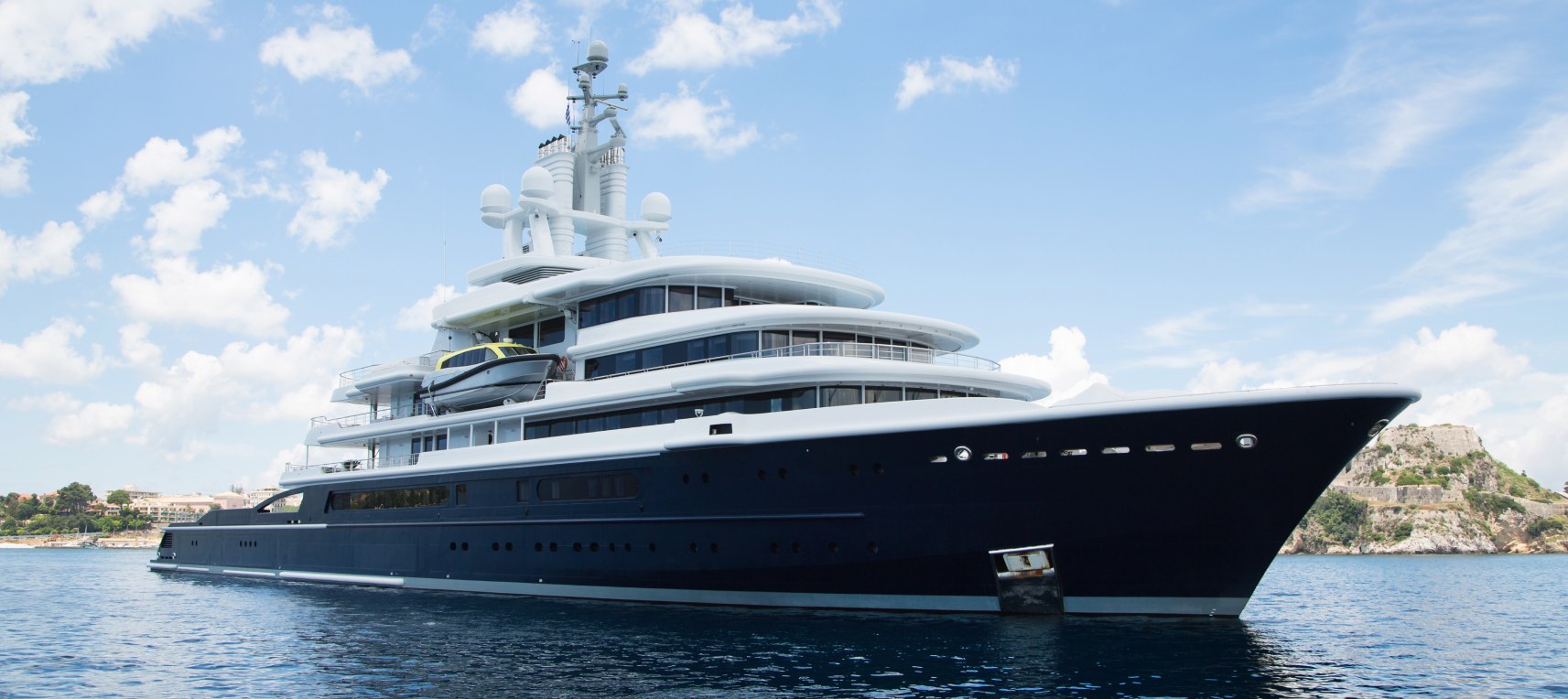 Blue and white mega yacht in the sea