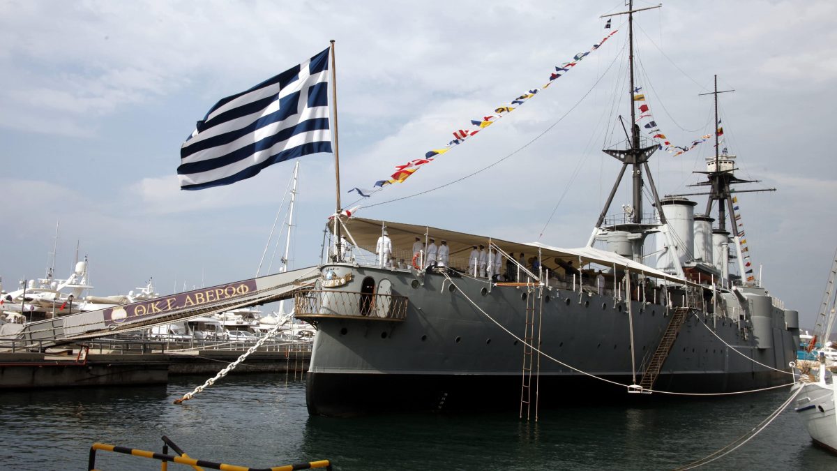 Docked Naval ship "Averof" with Greek flag and Naval officers onboard