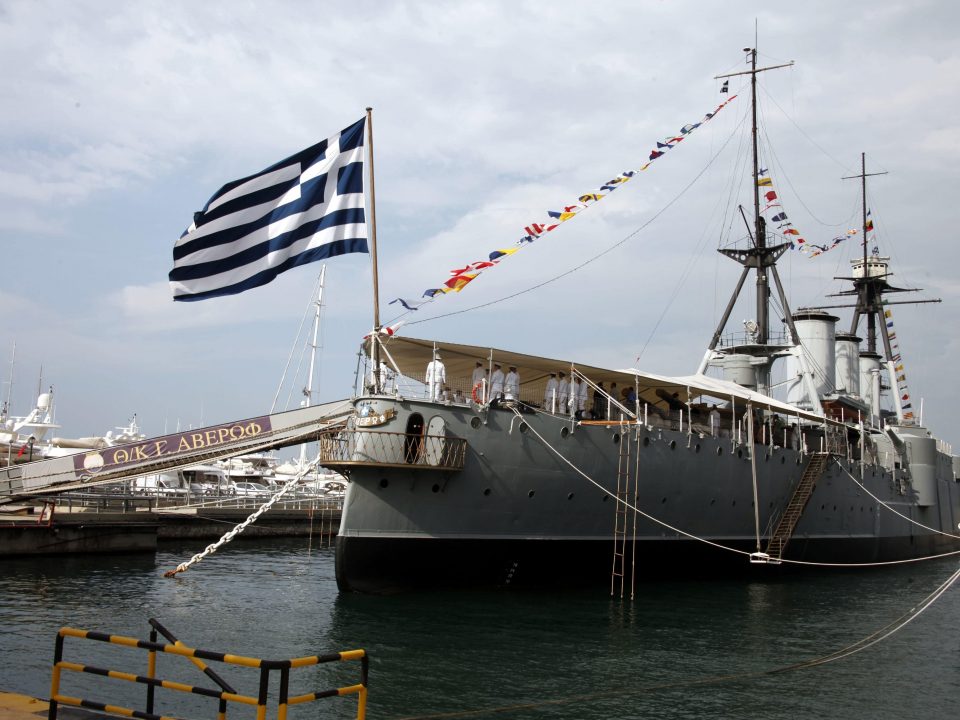 Docked Naval ship "Averof" with Greek flag and Naval officers onboard