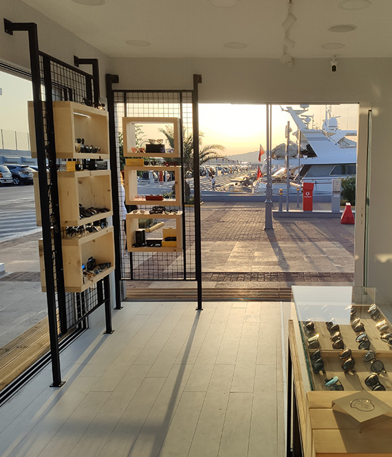 Interior Occhio Papavassiliou glasses store in Flisvos Marina at sunset