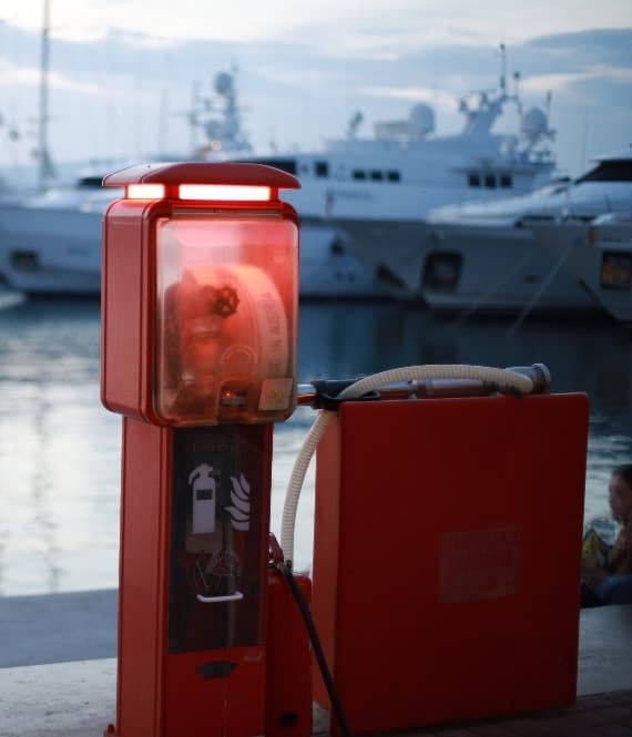 Red box fire hose on dock