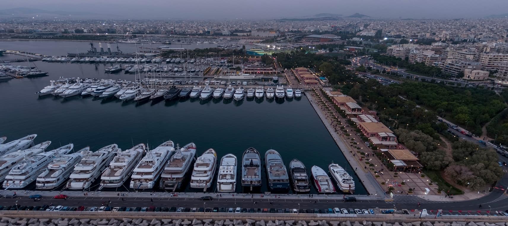 Aerial photograph docked yachts at Flisvos Marina, Athens at dusk